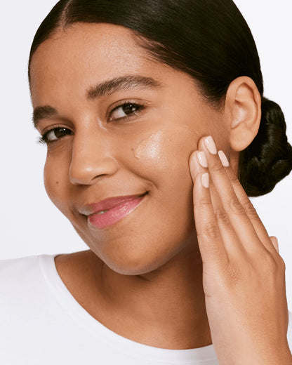 Moisture Surge™ Sheertint Hydrator Broad Spectrum SPF 25 - US 7058